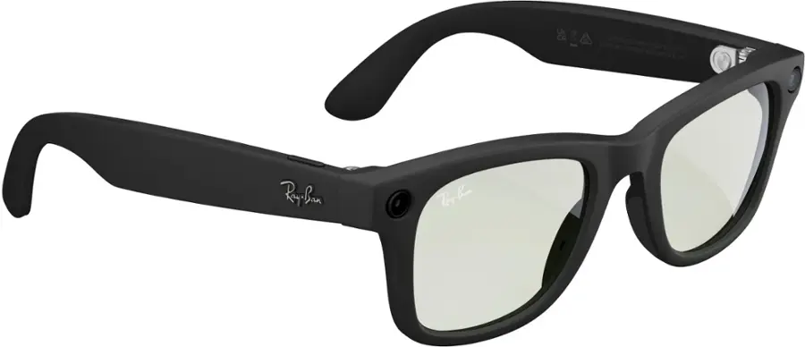The image features a pair of black sunglasses with a white lens. The sunglasses are designed by the brand Ray-Ban and are displayed against a white background. The sunglasses are positioned in a way that allows the viewer to see both the front and side of the glasses.