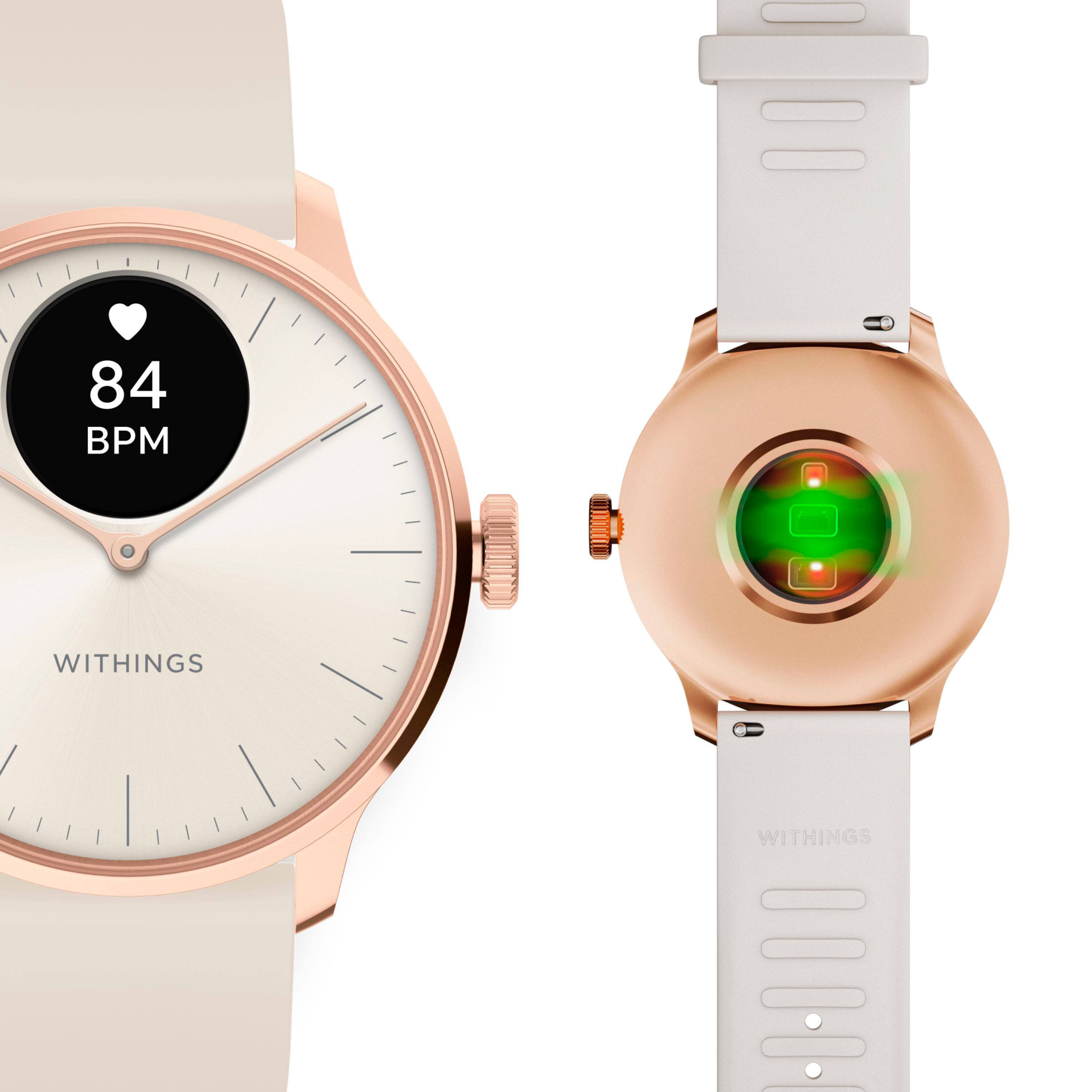 The text on the image reads "84 BPM WITHINGS WITHINGS." It seems that the text is a combination of two different watches, one with the brand name "Withings" and the other with the heart rate reading of 84 BPM. The watches are displayed side by side, showcasing their features and design.