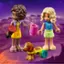 The image features two Lego figures, one holding a cup and the other holding a dog. The scene takes place in a desert setting, with a backdrop of mountains. The two Lego figures are standing next to each other, and there is also a dog figure present in the scene. The overall composition of the image showcases the playful and creative nature of Lego toys.