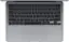 The image features a laptop computer with a keyboard. The keyboard has a number pad, which includes the numbers 1 to 9, as well as the letters A, S, D, F, G, H, J, K, L, and M. The laptop is open and ready for use.