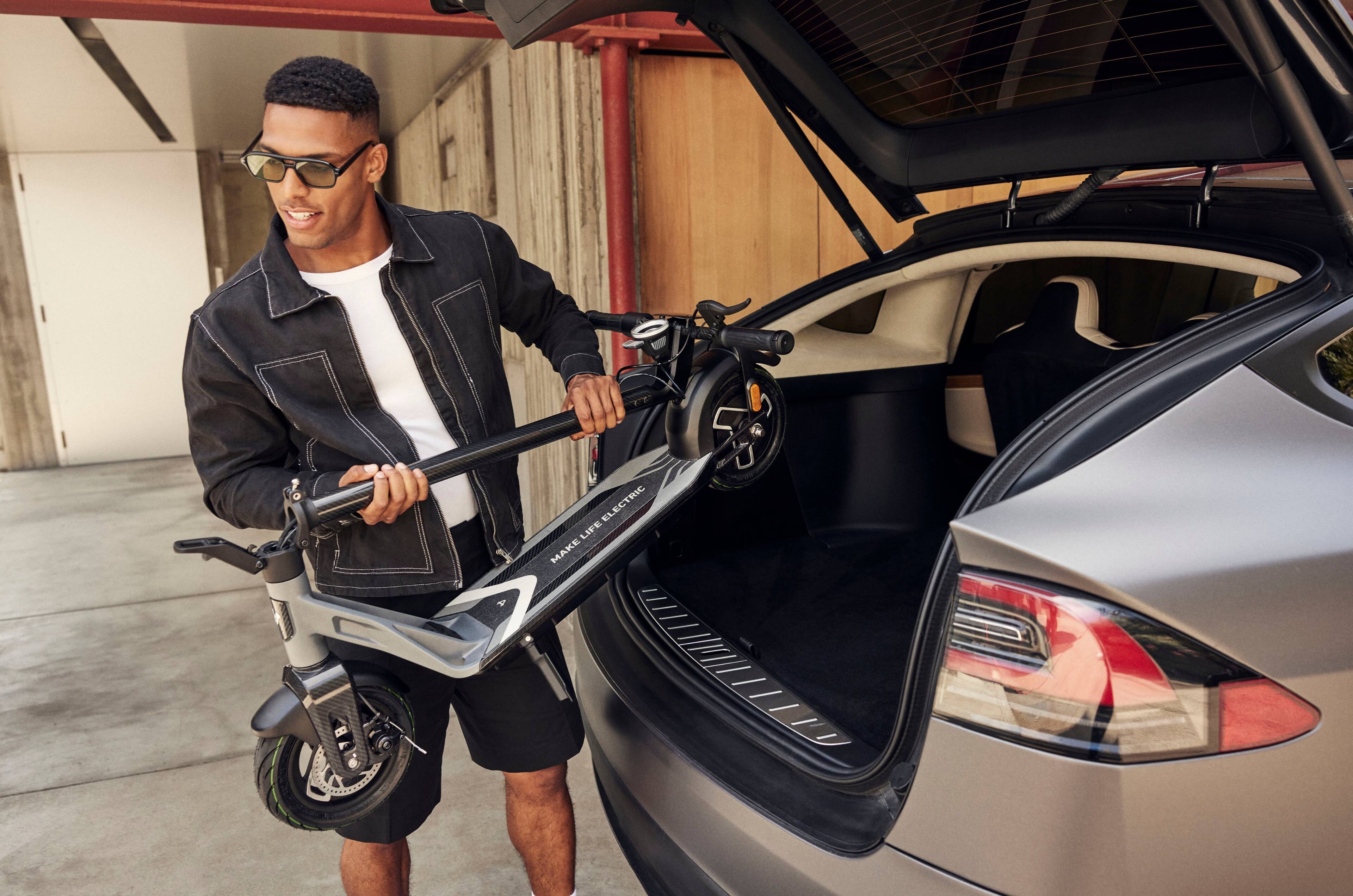 Alt View 15. NIU - KQi Air Carbon Fiber Foldable Electric Kick Scooter w/ 31 mi Range & 20mph Max Speed - Black.