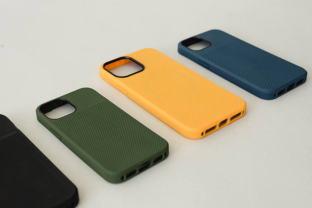 The image features four different colored cell phone cases, each with a unique design. The cases are arranged in a row, with one case being green, another yellow, and the other two being blue. The cases are placed on a white surface, which serves as a neutral background that highlights the vibrant colors of the phone cases.