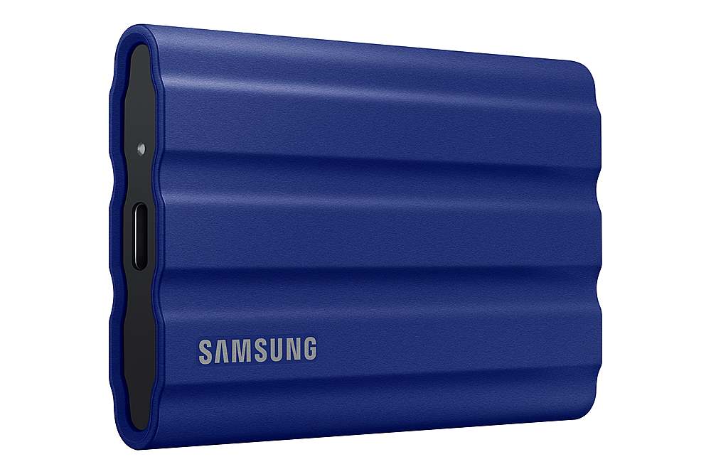 Front. Samsung - Geek Squad Certified Refurbished T7 Shield 2TB External USB 3.2 Gen 2 Rugged SSD IP65 Water Resistant - Blue.