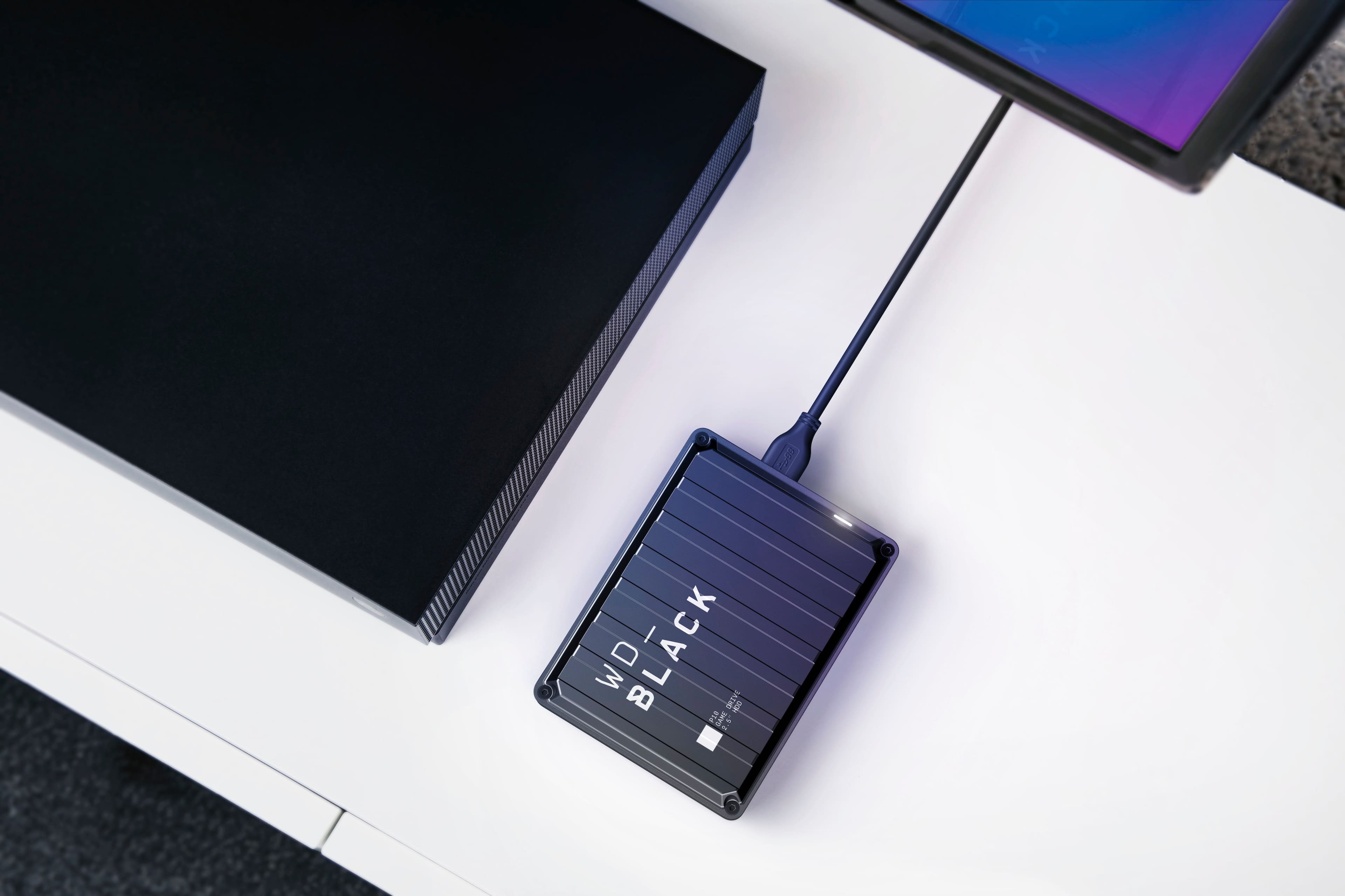 Alt View 1. WD - BLACK P10 2TB External USB 3.2 Gen 1 Portable Hard Drive - Black.