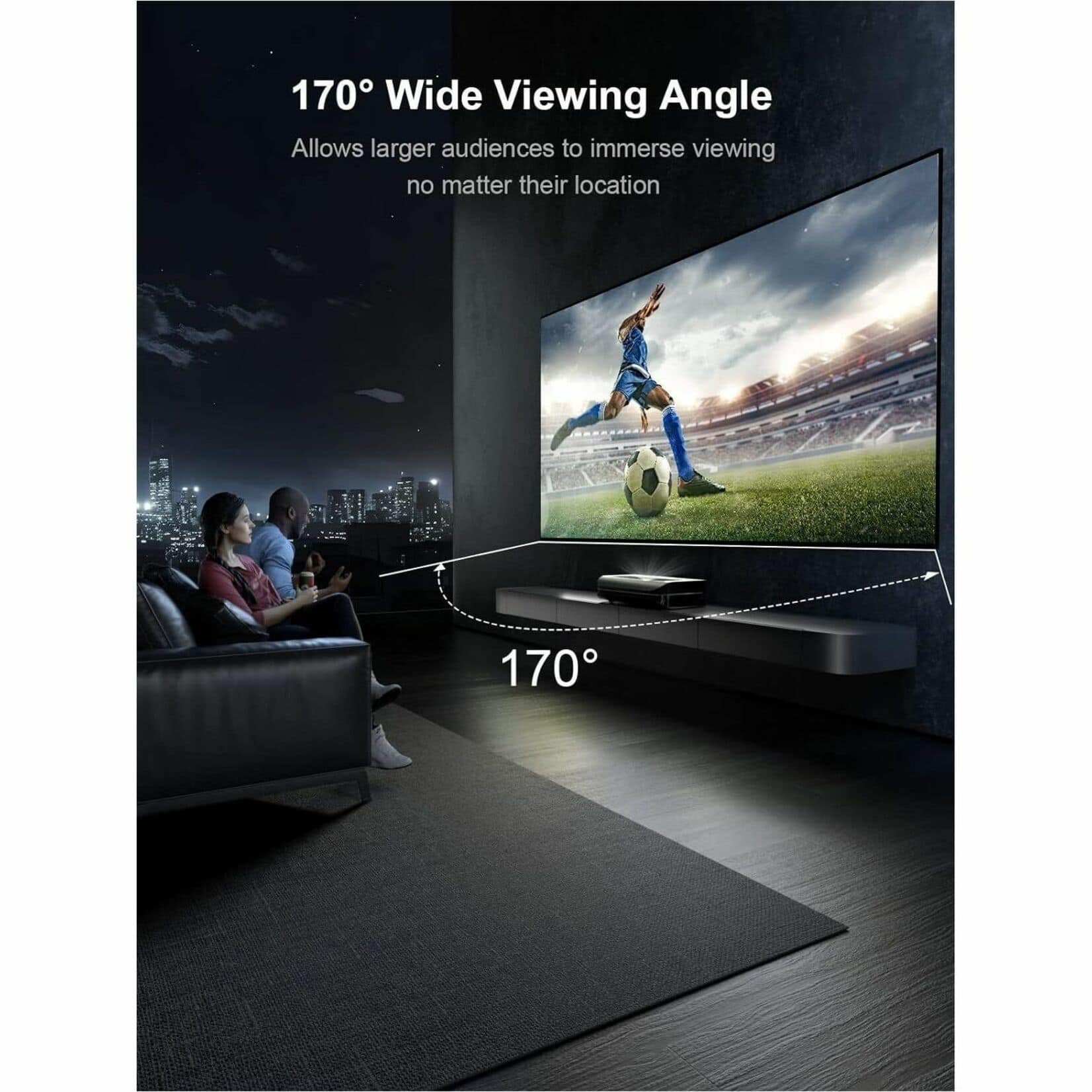 The image features a large flat screen TV with a man kicking a soccer ball on it. There are two people sitting on couches in front of the TV, watching the soccer game. The TV is described as having a 170-degree wide viewing angle, which allows for a larger audience to immerse themselves in the viewing experience, regardless of their location.