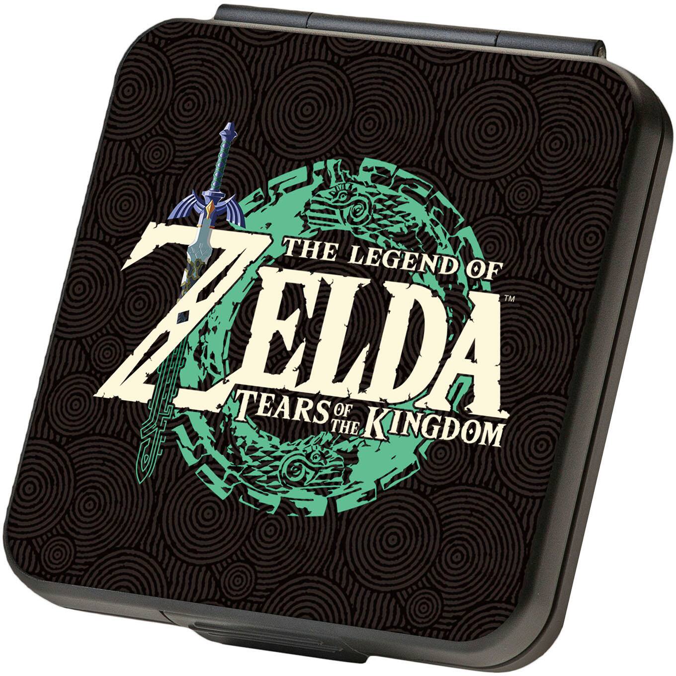 The Legend of Zelda: Tears of the Kingdom is a video game that features a green and black box. The box is decorated with a sword and shield, which are iconic elements of the Zelda series. The box is likely used to store or display game-related items, such as collectibles or merchandise.