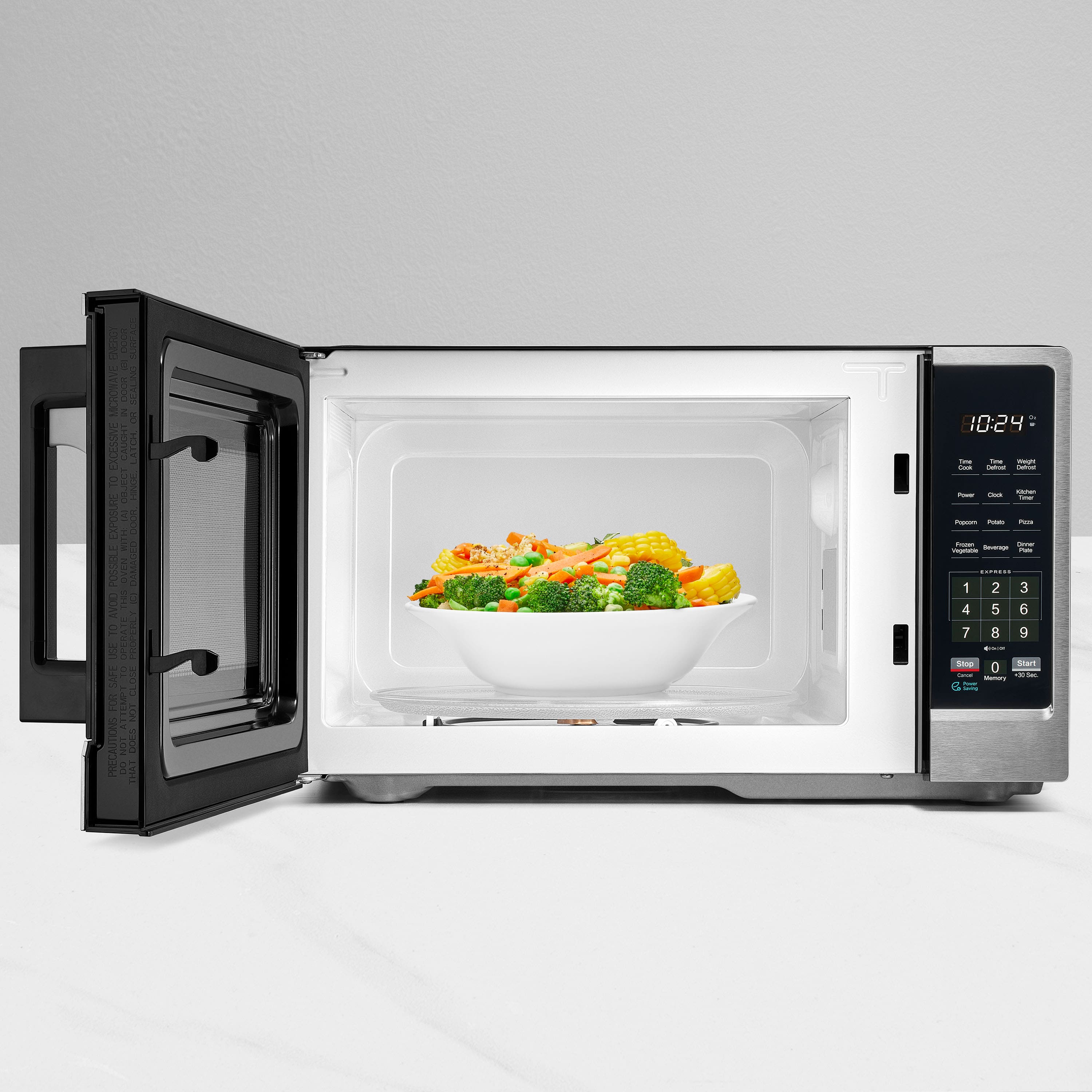 Alt View 17. Insignia™ - .9 Cu. Ft. Compact Countertop Microwave - Stainless Steel.