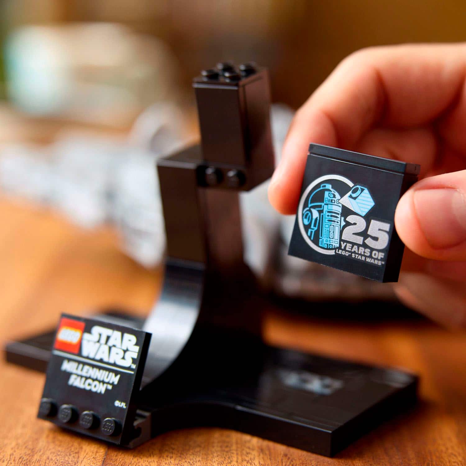 Left. LEGO - LEGO Star Wars Millennium Falcon 25th Anniversary Buildable Starship Model 75375.