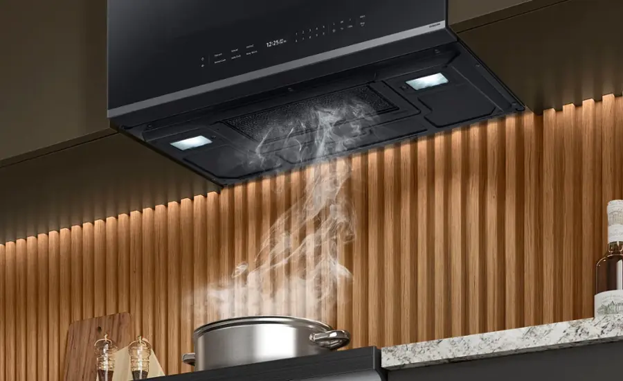 The text on the image reads "Nao - E AN 12:25 I . 2 2 1  a  & . e - 1 2 - - - LLLER GRAND C EMILIO." However, this text does not seem to be related to the image of the pot on the stove. It is possible that the text is unrelated or meant for a different context.