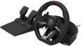 The image features a racing wheel and pedals, which are part of a racing simulator. The wheel is designed to resemble a real steering wheel, and it is accompanied by a set of pedals. The simulator is likely used for video games or other racing-related activities.