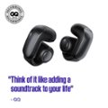 The image features a pair of black earbuds, which are recommended by GQ. The earbuds are positioned close to each other, and the GQ logo is visible in the background. The text "Think of it like adding a soundtrack to your life" is displayed prominently, emphasizing the benefits of using these earbuds.