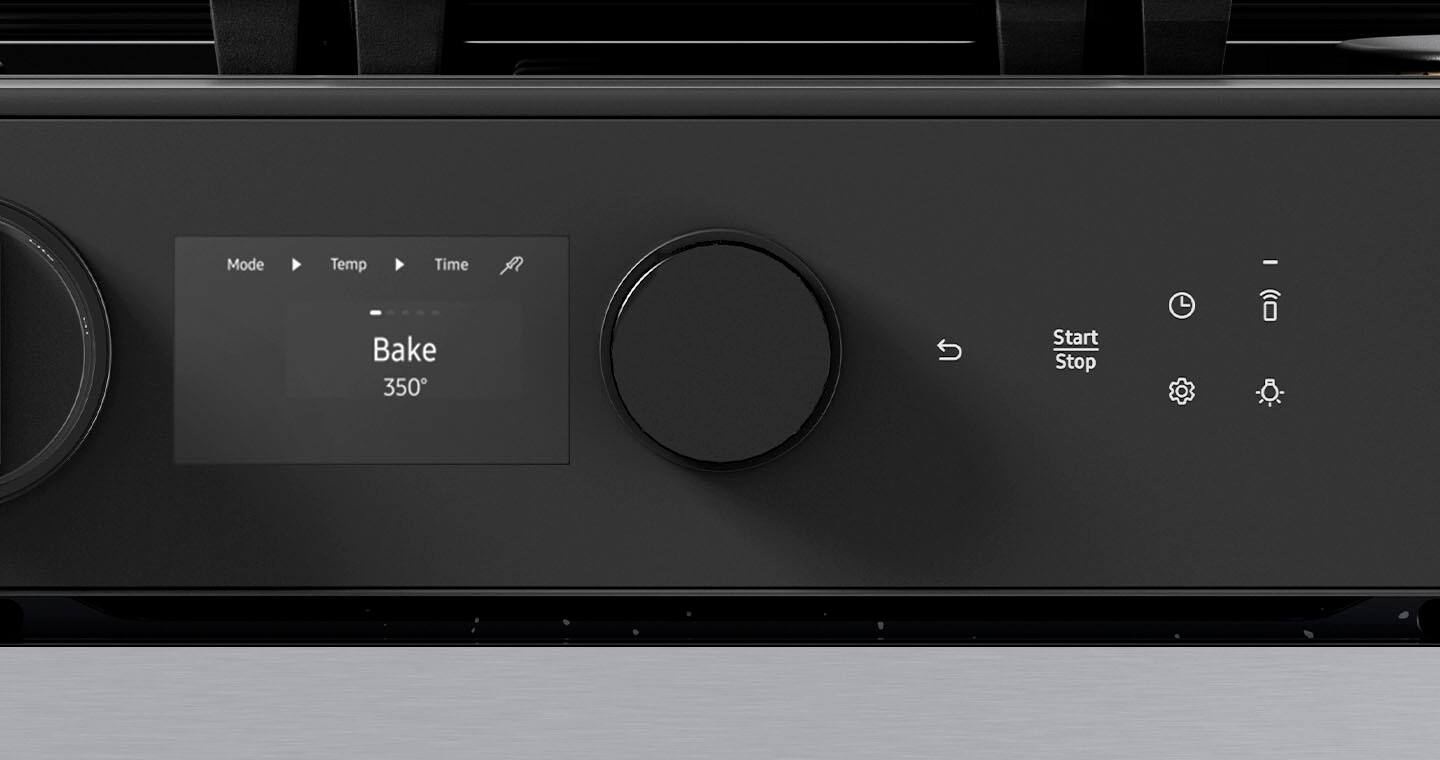 The image shows a black electronic device with a display screen that reads "Bake 350." The device has a knob on the front, which is likely used to control the temperature and time settings for the baking process. The display also shows the current time, which is essential for accurately timing the baking process.