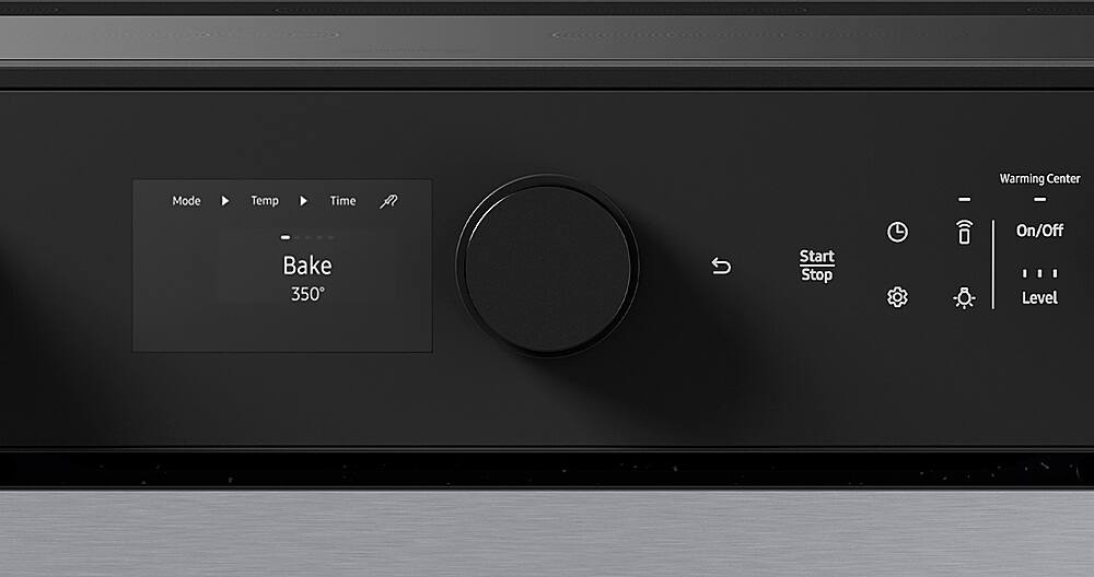 The image shows a black oven with a digital display. The display shows the mode, temperature, time, and warming center settings. The mode is set to "Bake," and the temperature is set to 350 degrees. The time and warming center settings are not visible in the image. The oven has a knob to control the settings, and the display is located on the front of the oven.