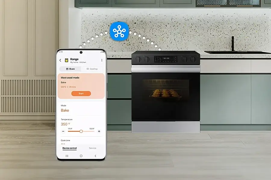 The image features a kitchen with a stove and an oven. A cell phone is placed next to the stove, which is set to bake at 220 degrees Celsius for 30 minutes. The image also shows a blue app icon, likely related to the oven or cooking process. The oven is located below the stove, and the app is displayed on the cell phone, indicating that it is being used to control the oven or monitor the cooking process.