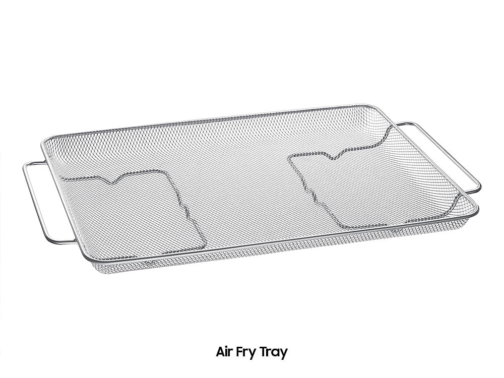 The image shows a close-up view of an air fry tray, which is a type of cooking appliance. The tray is made of plastic and features a mesh design, allowing for even heat distribution during the cooking process. The tray is placed on a white background, making it the main focus of the image. The air fry tray is designed to cook food quickly and evenly, providing a healthier alternative to traditional frying methods.