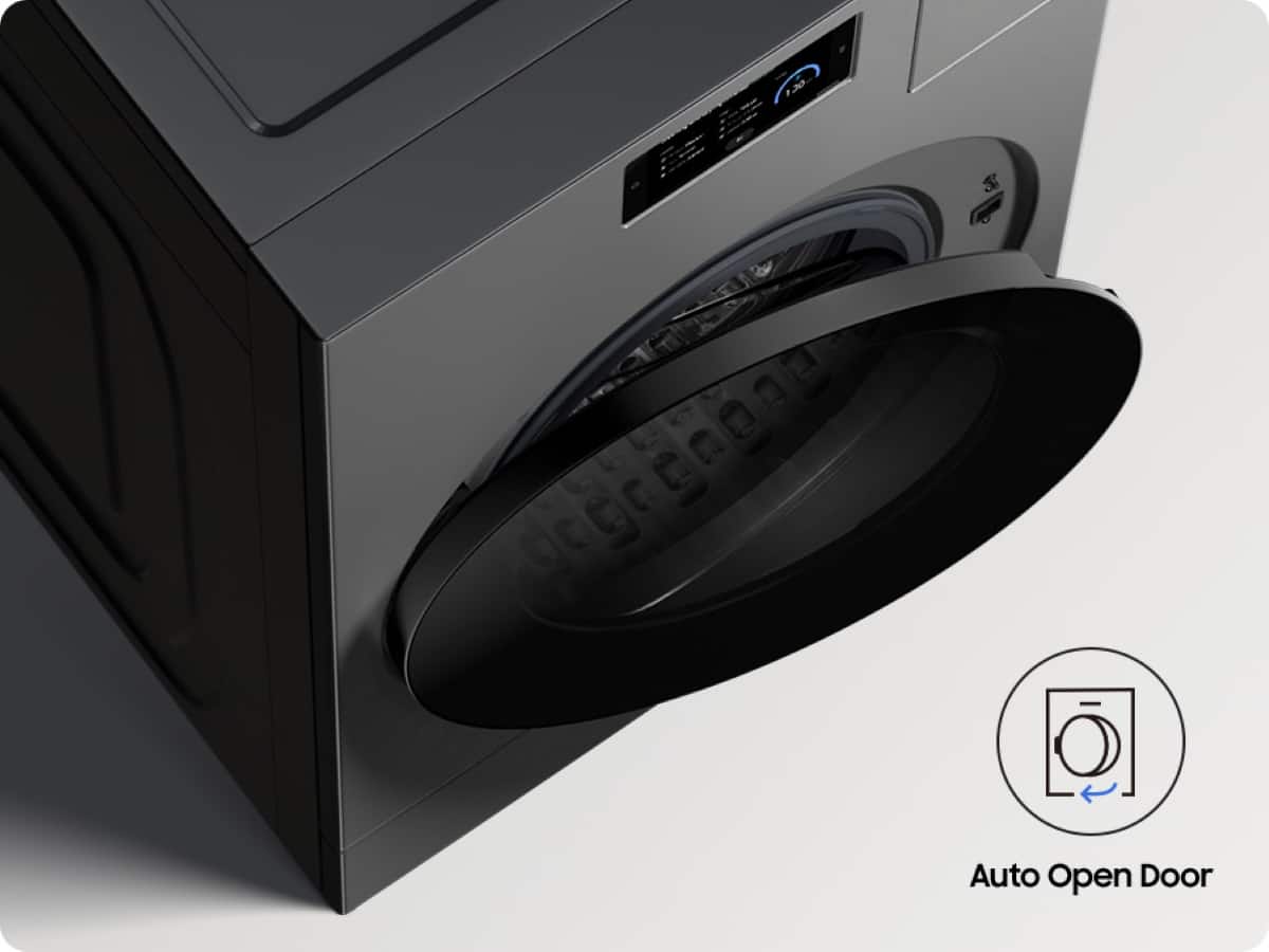 The image features a large, gray appliance with a door that is designed to open automatically. The appliance appears to be a washing machine or dryer, as it has a large opening and a rotating drum. The appliance is placed on a white background, making it stand out prominently in the image.