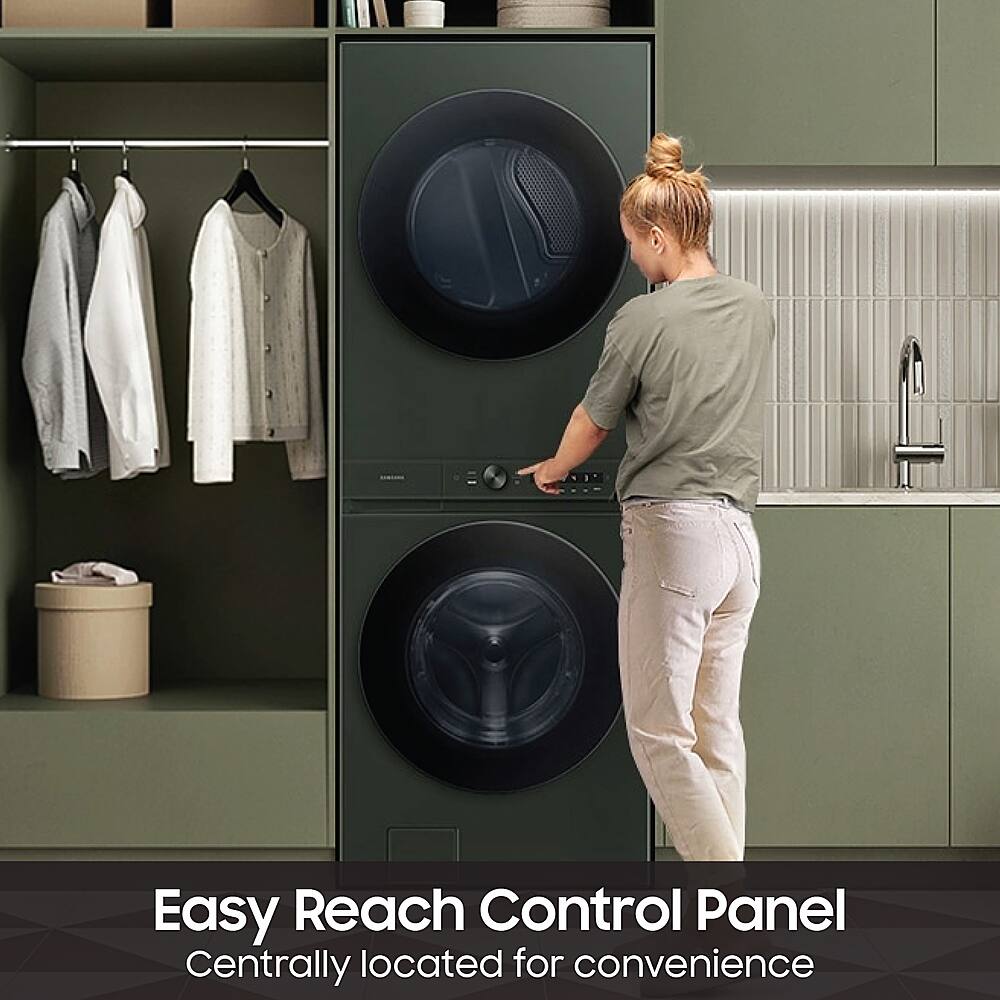 The image features a woman standing in front of a washer and dryer combo unit. The washer and dryer are stacked, and the control panel is centrally located for convenience, making it easy to reach and operate. The woman appears to be using the control panel to operate the washer and dryer.