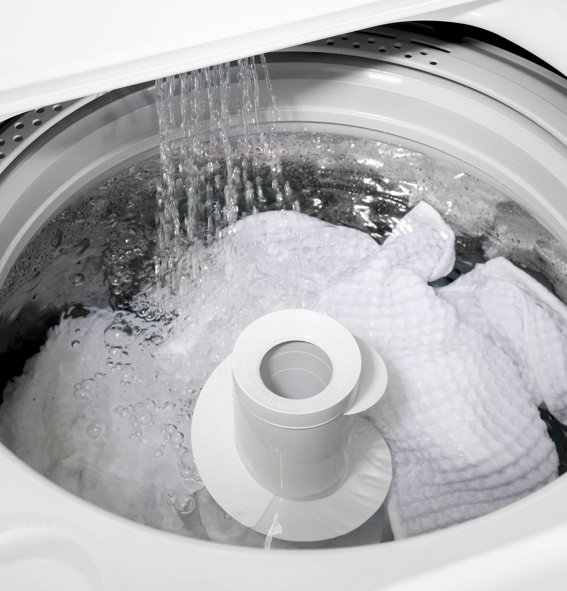 Alt View 23. GE - 4.3 Cu. Ft. High-Efficiency Top Load Washer with Cold Plus - White with Silver Matte.