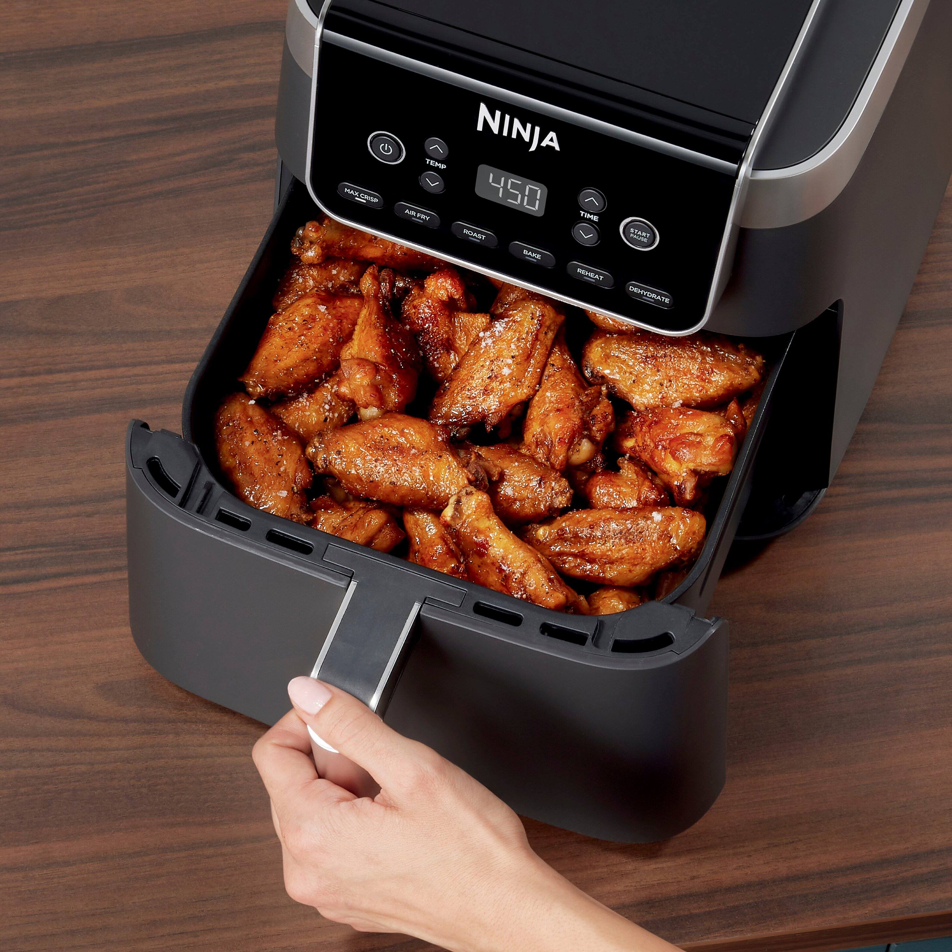 The Ninja imE 450 is a small appliance with an XL capacity. It features a 6.5-quart ceramic-coated, nonstick basket that can hold up to 5 pounds of French fries or 9 pounds of chicken wings.