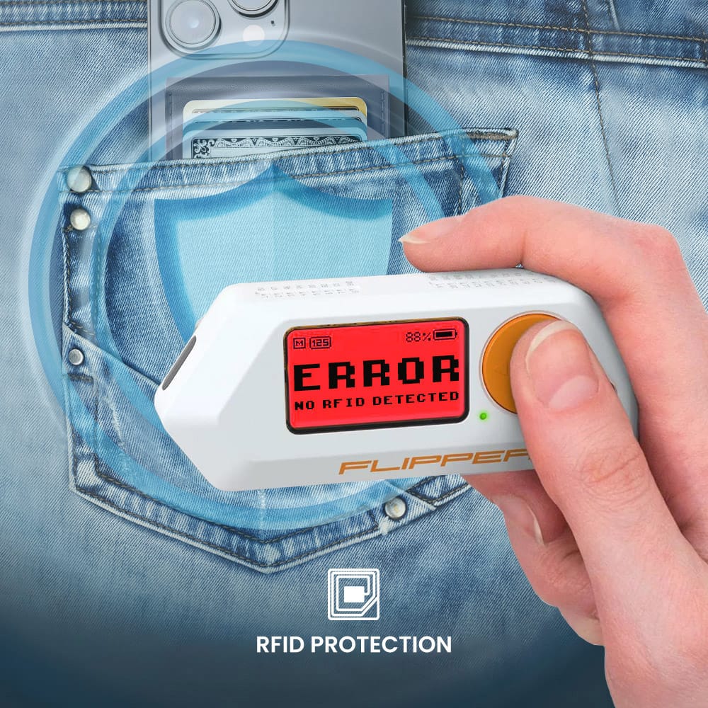 The image features a hand holding a small electronic device, possibly an RFID protector or a wallet protector, with the words "Error No RFID detected" displayed on the device. The hand is reaching into a pocket, possibly to remove a wallet or a cell phone. The image is categorized under Wallets_and_Clutches, which suggests that the device may be used to protect wallets or other personal items from RFID theft.