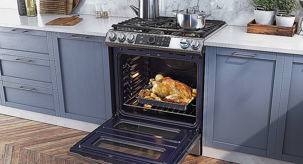 Alt View 22. Samsung - Open Box Flex Duo 6.3 cu. ft.  Front Control Slide-in Dual Fuel Range with Smart Dial, Air Fry & WiFi - Black Stainless Steel.