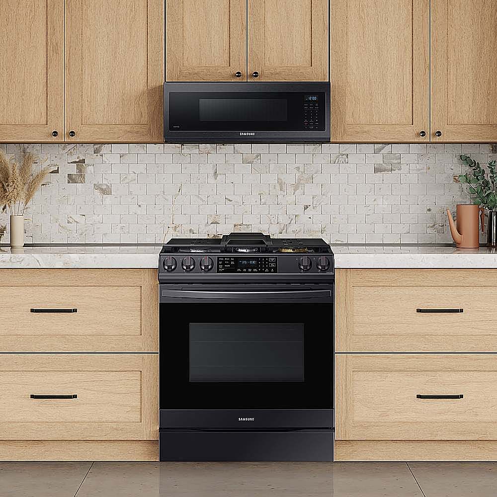 Alt View 12. Samsung - Open Box 1.1 cu. ft. Smart SLIM Over-the-Range Microwave with 400 CFM Hood Ventilation, Wi-Fi & Voice Control - Black Stainless Steel.