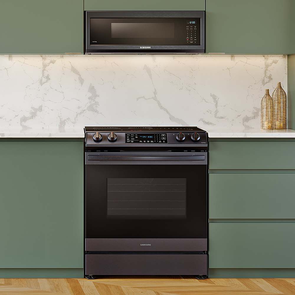 Alt View 13. Samsung - Open Box 6.3 cu. ft. Smart Instant Heat Slide-in Induction Range with Air Fry & Convection+ - Black Stainless Steel.