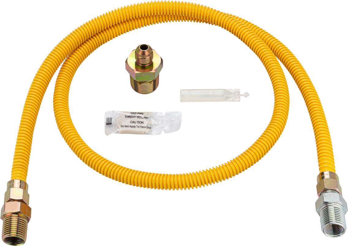 The image features a yellow hose with a connector on the end, along with a metal fitting and a plastic fitting. The hose is connected to a pipe, and there is a metal fitting attached to the end of the hose. The hose is also accompanied by a metal connector and a plastic connector. The hose is likely used for transporting water or other fluids.