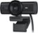 The image features a black webcam with a large lens, which is an ultra-wide 4K camera with a 8.5MP sensor. The webcam is mounted on a stand and appears to be a high-quality device for capturing video and images.