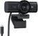 The image features a Logitech webcam with various specifications and features labeled. The webcam has an ultra-wide 4K resolution, auto-light correction, and auto-framing capabilities. It also has a USB-C connectivity and a magnetic mount for easy attachment. Additionally, the webcam has a noise-reducing microphone and a privacy shutter. The webcam is designed with an 8.5MP sensor and supports ultra-HD 4K resolution.