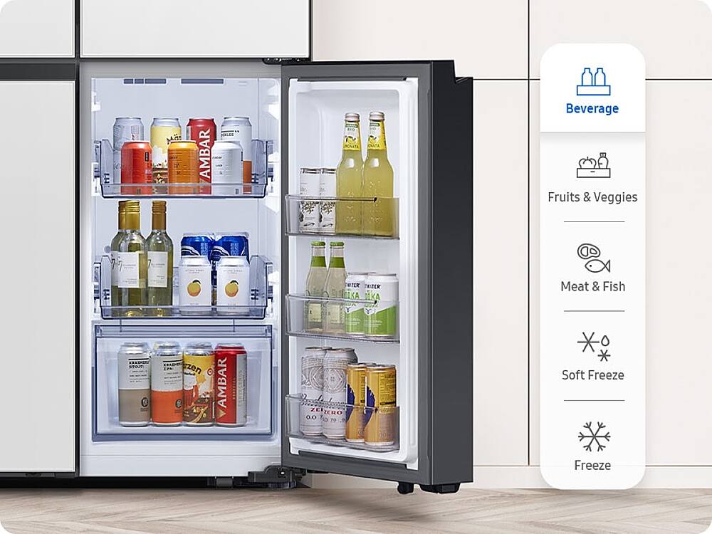 The image shows a refrigerator with its door open, revealing a variety of food and drinks inside. The refrigerator is stocked with several bottles, including both alcoholic and non-alcoholic beverages. There are also fruits and vegetables stored in the refrigerator, as well as a few canned items. The refrigerator is described as being full, indicating that it is well-stocked and ready for use.