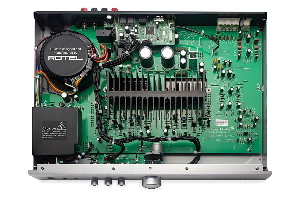 Custom designed and manufactured by Rotel. Cautious: Do not remove the cover. Refer servicing to qualified service personnel. 75806-0000 SVA Rotel F 016-10KI-01-01 01 OE Main Bd Ver.C Ti 104530.