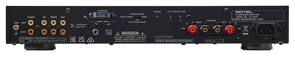 The text on the image is as follows:

1. GND PHONO LEFT
2. C TUNER AUX
3. Qualcomm xpt HD BLUETOOTH DIGITAL INPUT
4. POWER CONTROL SIGNAL SENSE NONE
5. AUTO POWER DOWN SERVICE 12V TRIGGER OUT 5 2
6. SPEAKER RIGHT
7. SPEAKER LEFT
8. ROTEL INTEGRATED AMPLIFIER MODEL NO A11MKE
9. POWER CONSUMPTION 150W
10. RIGHT TIT DOUBLE INSULATION
11. When servicing use only identical replacement parts
12. UK EAC CA CAUTION RISK OF SHOCK WARNING SHOCK HAZARD-DO NOT OPEN SRSQqut DE OHCC LECTRIOUE-NG PAS OURR CLASS 2 WIRING
13. SPEAKER IMPEDANCE 8 OHMS NOMINAL
14. SERIAL NO