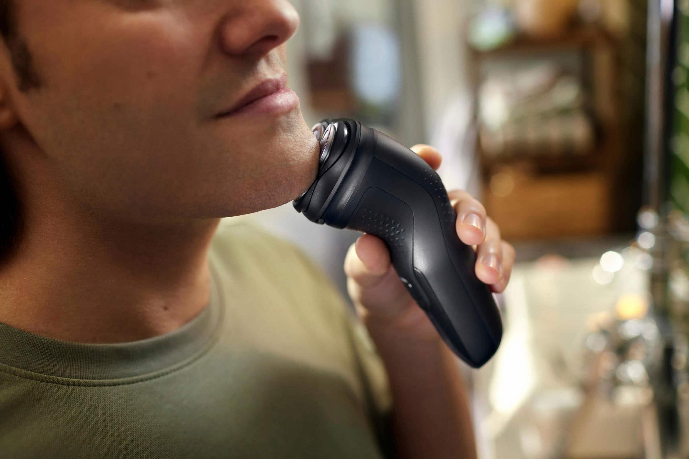 Left. Philips Norelco - Philips Norelco Shaver 2400, Cordless Electric Shaver with Pop-Up Trimmer - Deep Black.