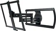 The image features a black TV stand with a flat screen TV mounted on it. The TV stand is designed to hold the TV securely and provide a stable base. The stand is made of metal and has a sleek, modern appearance. The TV is positioned in the center of the stand, making it the focal point of the room. The stand is likely made by the brand Sanus, known for its high-quality TV stands and mounts.