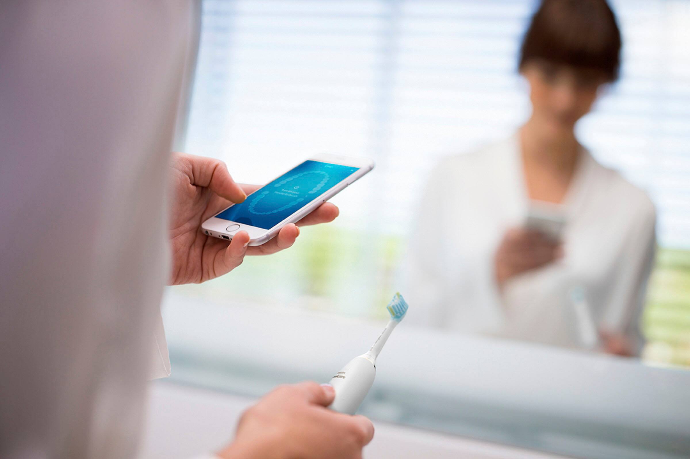 Left. Philips Sonicare - Philips Sonicare DiamondClean Smart Electric, Rechargeable Toothbrush for Complete Oral Care – 9300 Series - White.