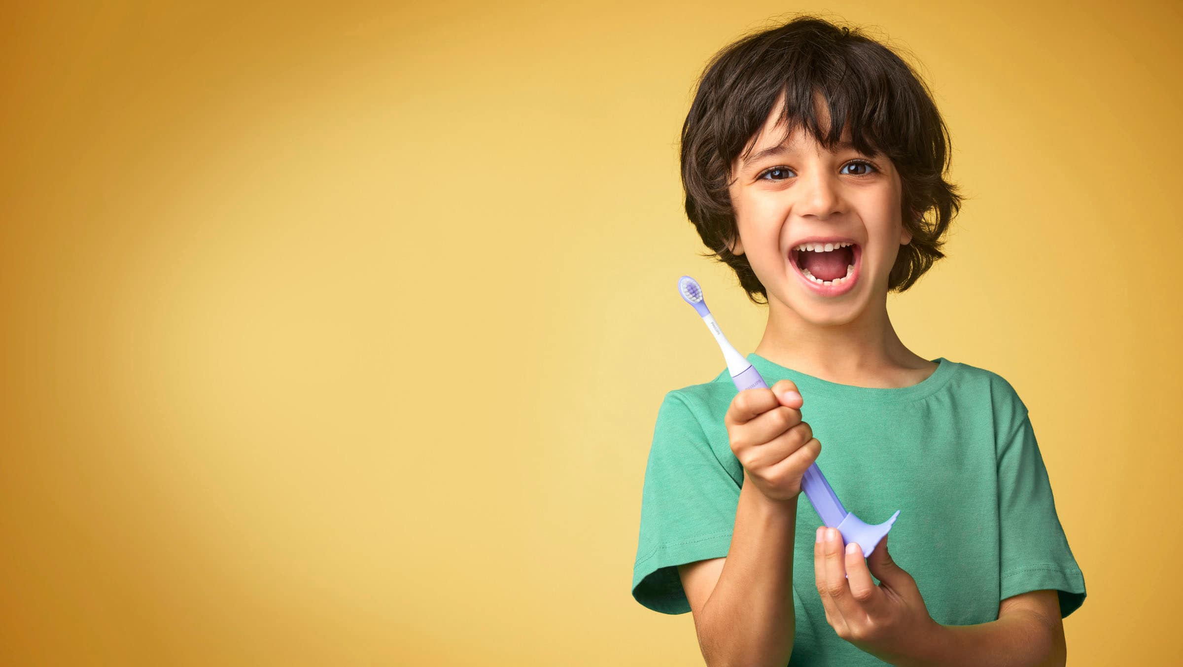 Left. Philips - Philips One for Kids Battery Toothbrush - Gradient Purple Fade.