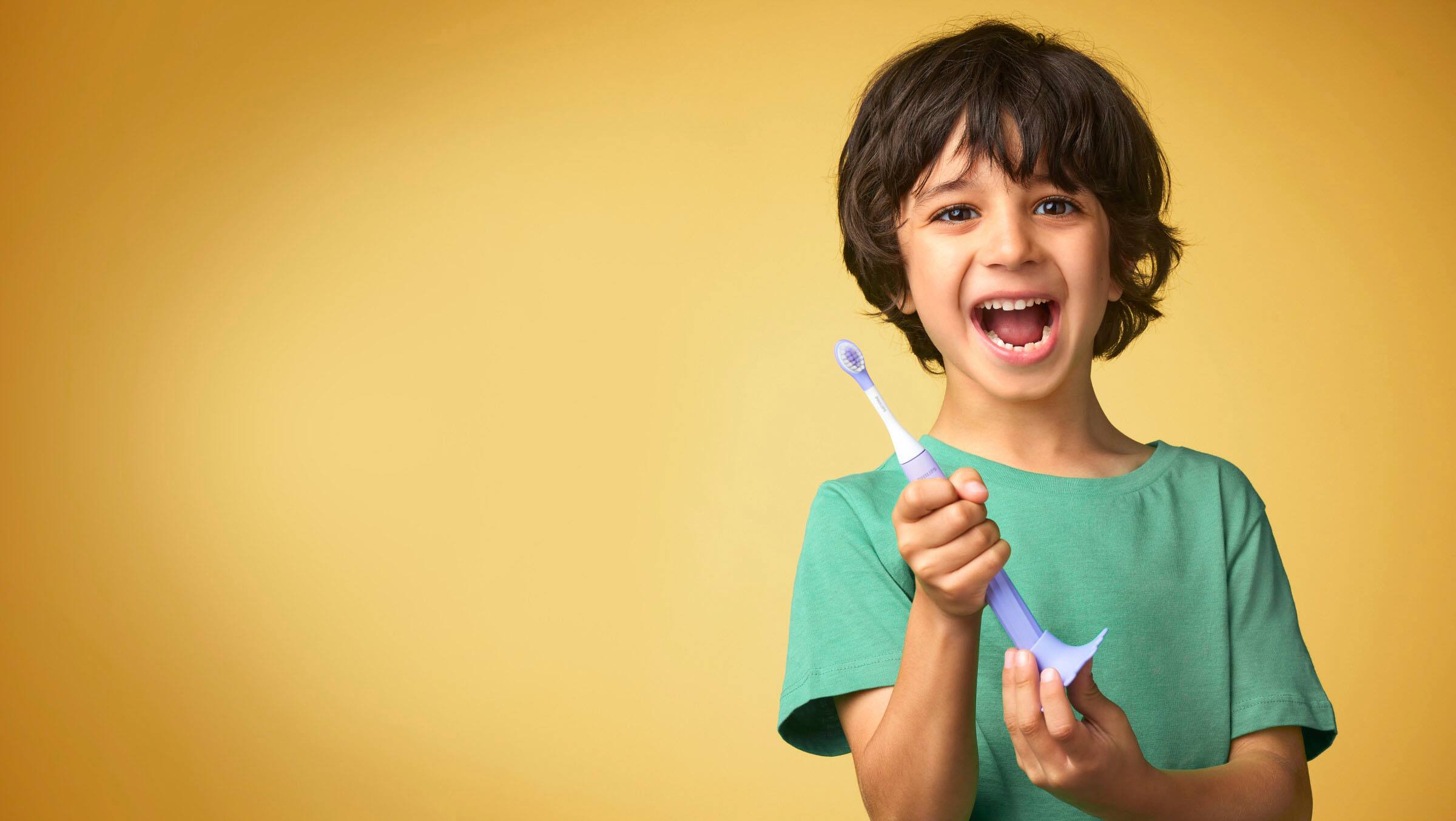 Left. Philips - Philips One for Kids Battery Toothbrush - Gradient Purple Fade.