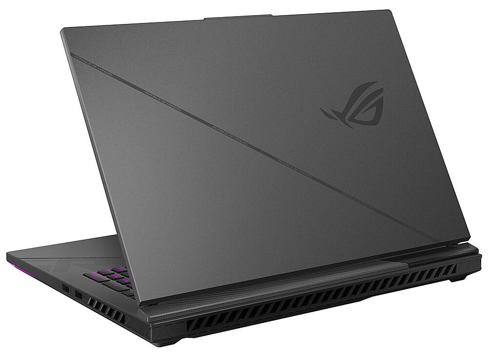 The image features a black laptop computer with a purple keyboard. The laptop is open and ready for use. The brand of the laptop is Asus.