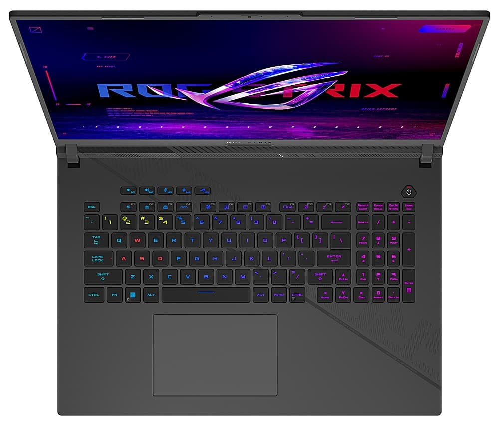 The image features a laptop with a purple and black color scheme. The laptop is open, revealing its keyboard and a purple and black screen. The screen displays the word "Rix" in large letters. The keyboard is equipped with a purple and black color scheme as well, and it has a purple and black spacebar. The laptop is likely designed for gaming or other high-performance tasks, given its colorful and visually appealing design.