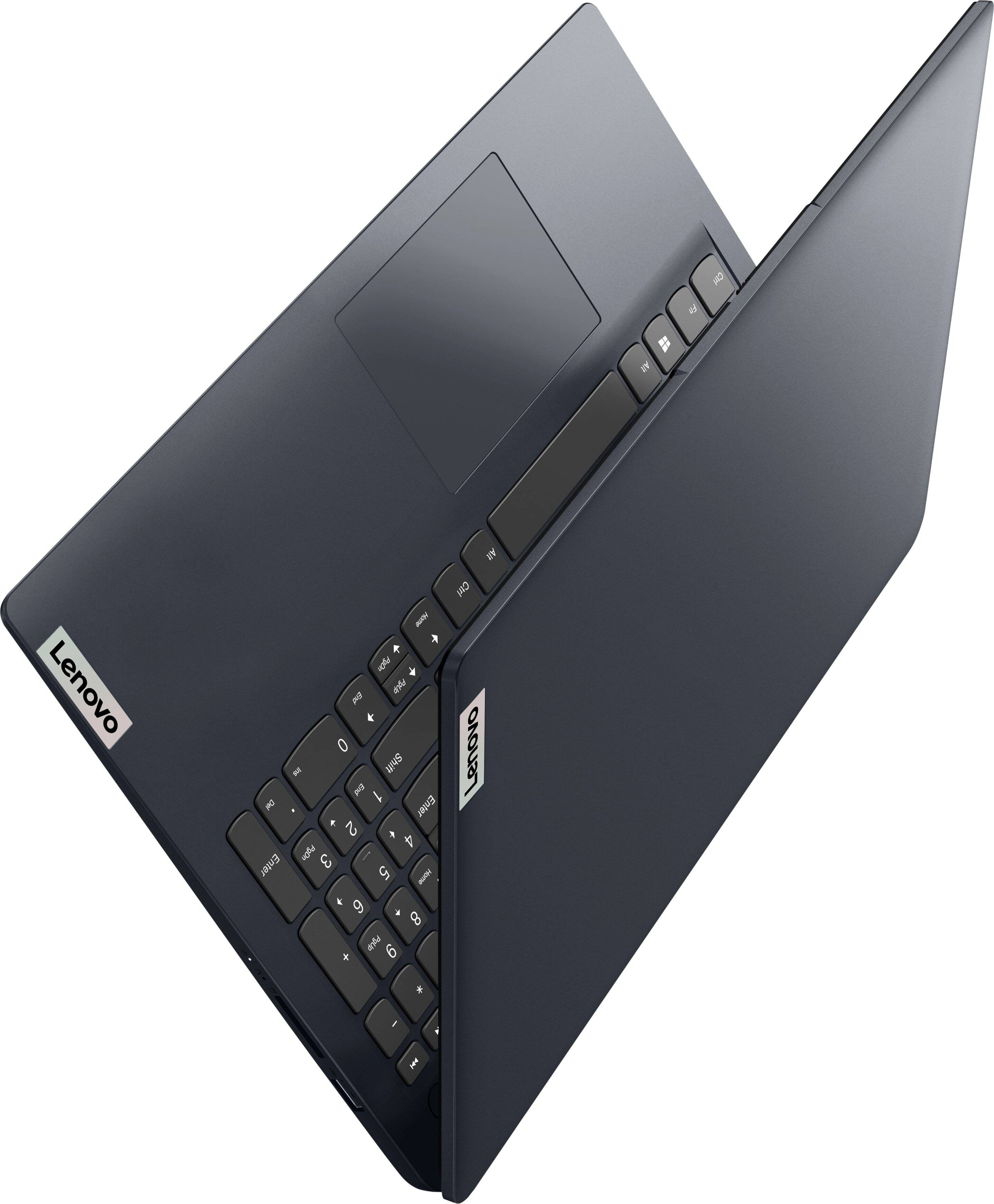 The image features a black laptop with a keyboard and a screen. The keyboard has a few keys missing, including the numbers 1, 2, and 3. The laptop is open and positioned on a white background.