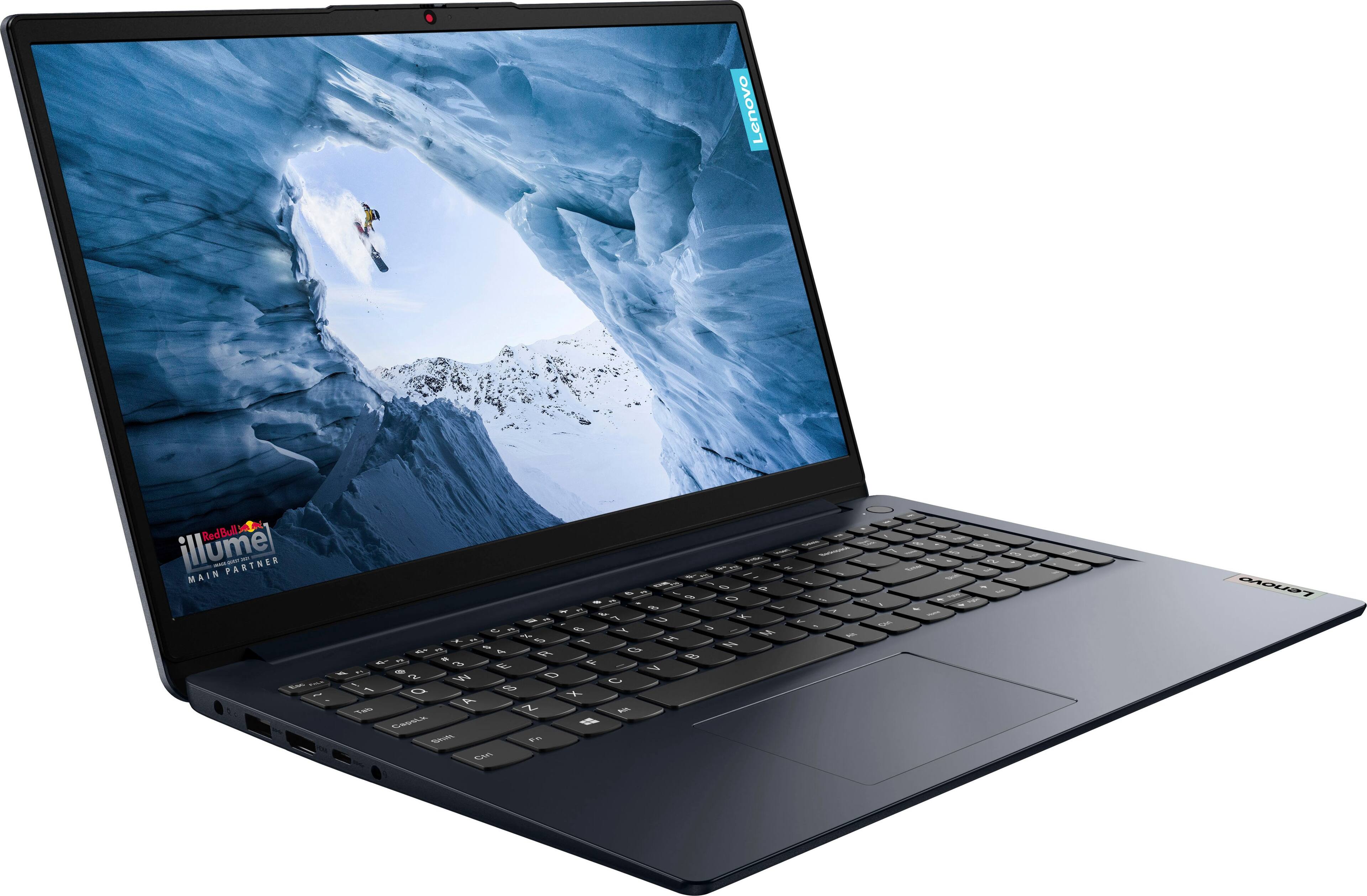 The image features a laptop computer with a screen displaying a snowy mountain. The laptop is open and ready for use. The screen is large, covering most of the laptop's surface. The laptop is positioned on a white background, which highlights the device and its screen.