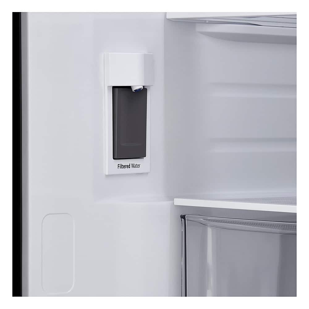 The image shows a white refrigerator with a water dispenser on the door. The water dispenser is labeled "Filtered Water," indicating that the water coming out of the dispenser is filtered and safe to drink. The refrigerator is white, and the water dispenser is located on the door, making it easily accessible for users.