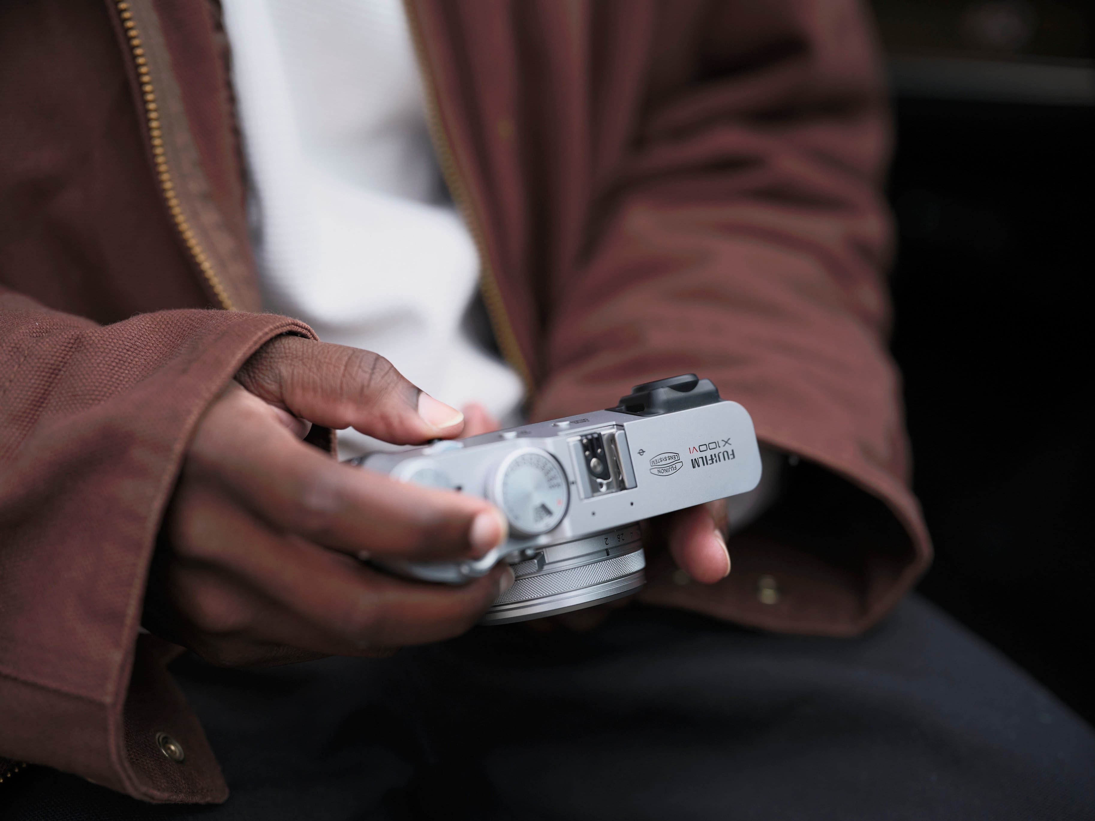 A person is holding a camera in their hand.