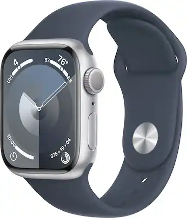 The image shows a watch face with the time of 15:00 displayed. The watch is black and gray in color. The watch face also includes a compass and a thermometer, which indicates that it is a smart watch. The watch is placed on a white background, making it stand out prominently.