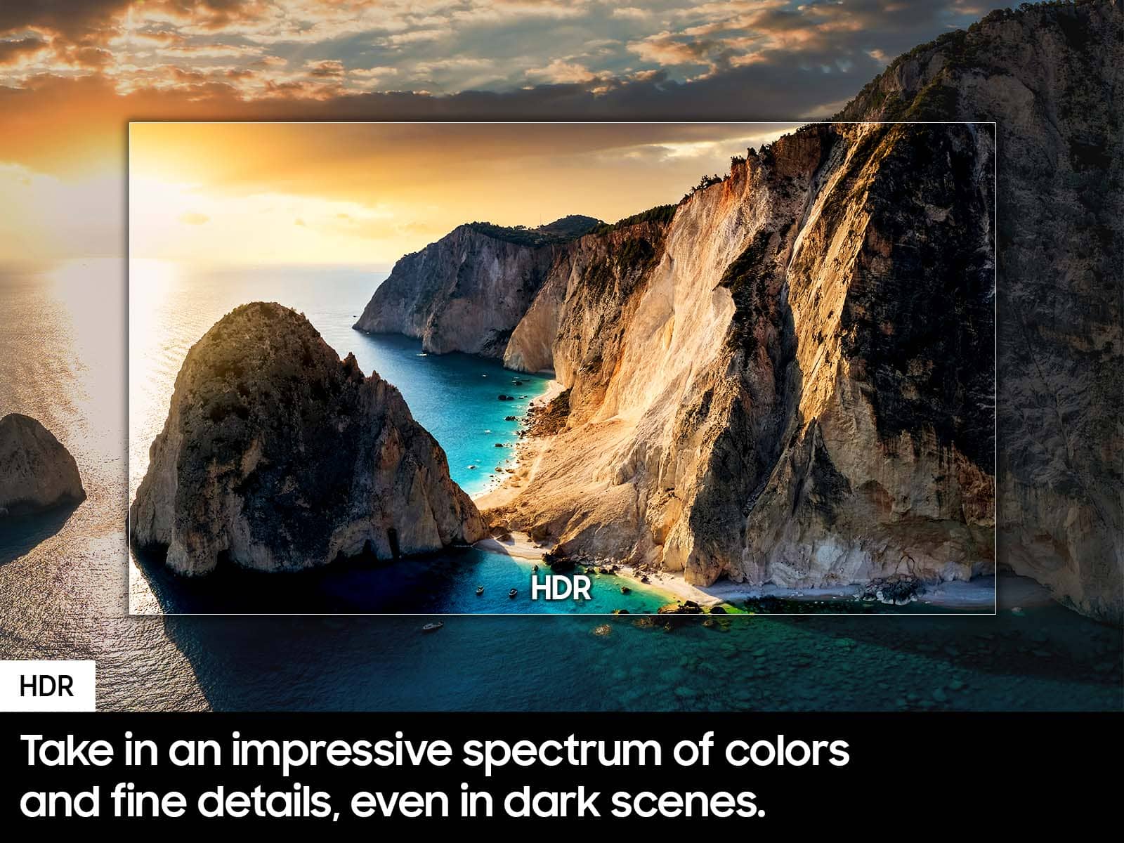 The image features a beautiful scene of a cliff overlooking the ocean, with a sunset in the background. The text on the image reads, "Take in an impressive spectrum of colors and fine details, even in dark scenes." This suggests that the image is promoting a high-definition display, such as an HDR television, which can provide an enhanced viewing experience by offering vibrant colors and sharp details, even in low-light conditions.