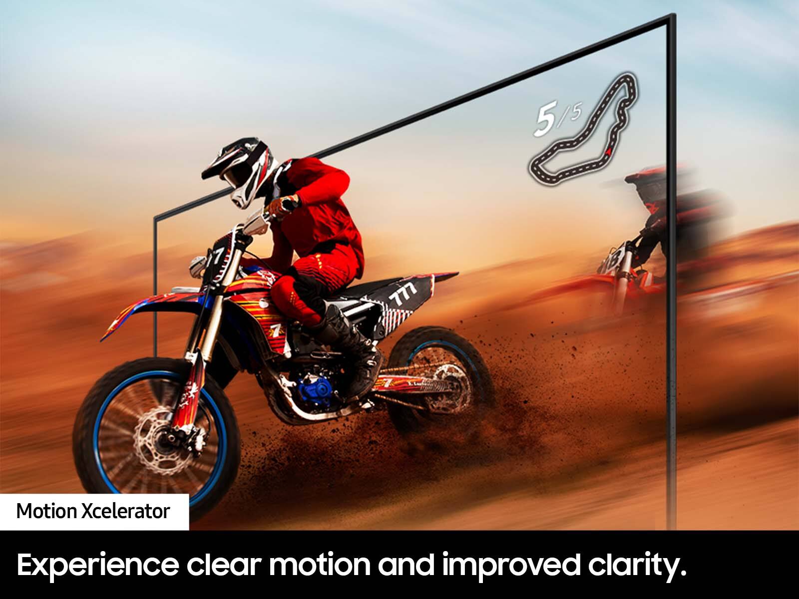 The image features a man riding a dirt bike on a dirt track, with a blurry background. The focus of the image is on the rider and the motorcycle, which is captured in motion. The image is described as a "Motion Xcelerator" and is advertised as providing an "Experience clear motion and improved clarity."