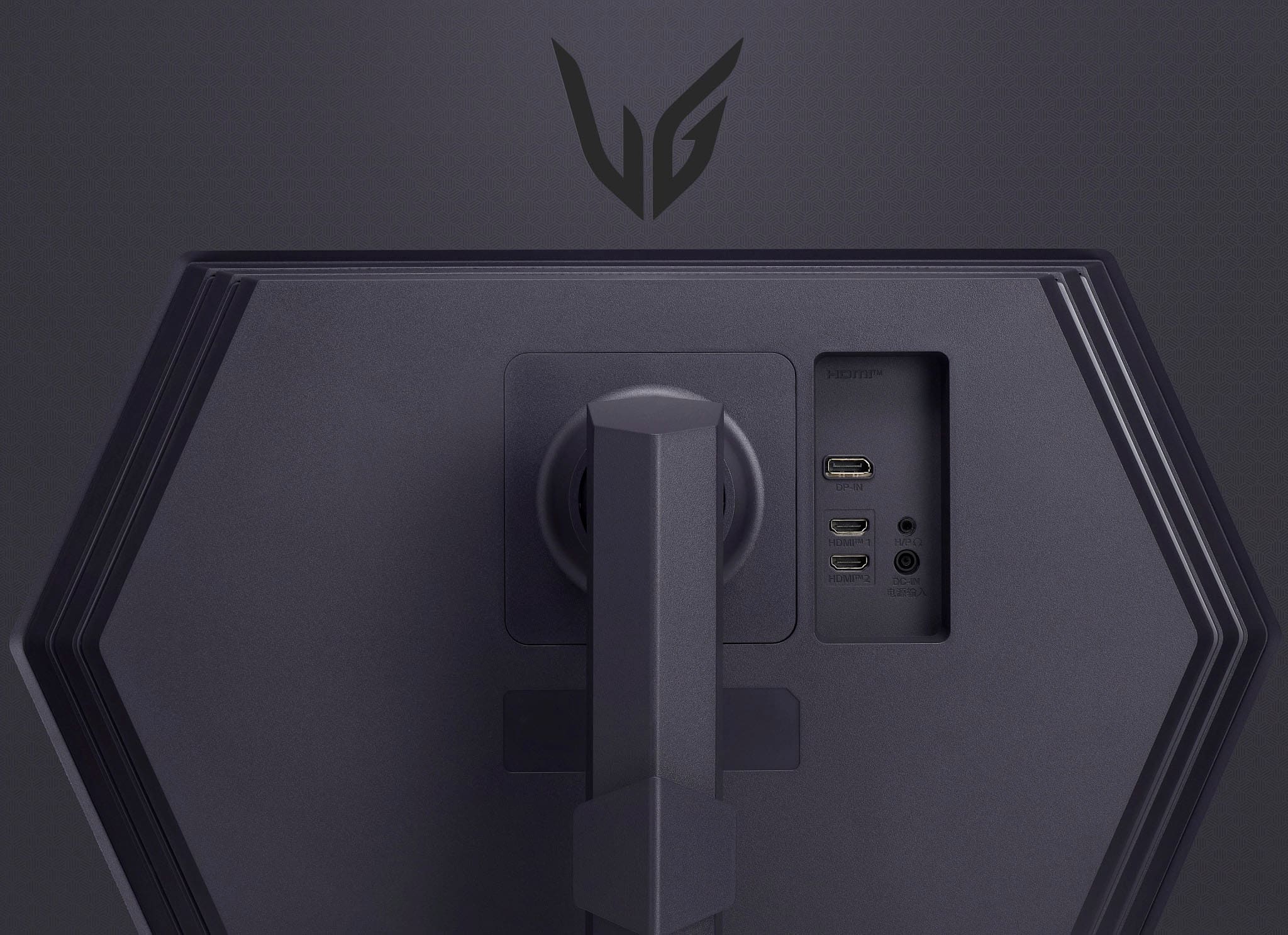 The image features a black box with a V logo on it. The box has a USB port and a HDMI port. There is also a small black remote control in the image.