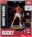 The image features a Rocky Balboa action figure, which is a limited edition collectible from the Movie Maniacs line. The figure is in its original packaging and includes a collector card with a stand and a bonus item. The limited edition of this figure has only 6,400 pieces produced, making it a rare and valuable collectible for fans of the Rocky franchise.