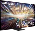 The image features a large Samsung Neo QLED 8K television screen, which is the main focus of the scene. The television screen is filled with a vibrant and colorful display, likely showcasing the capabilities of the 8K resolution. The screen is prominently placed in the center of the image, drawing attention to its impressive size and high-quality display.